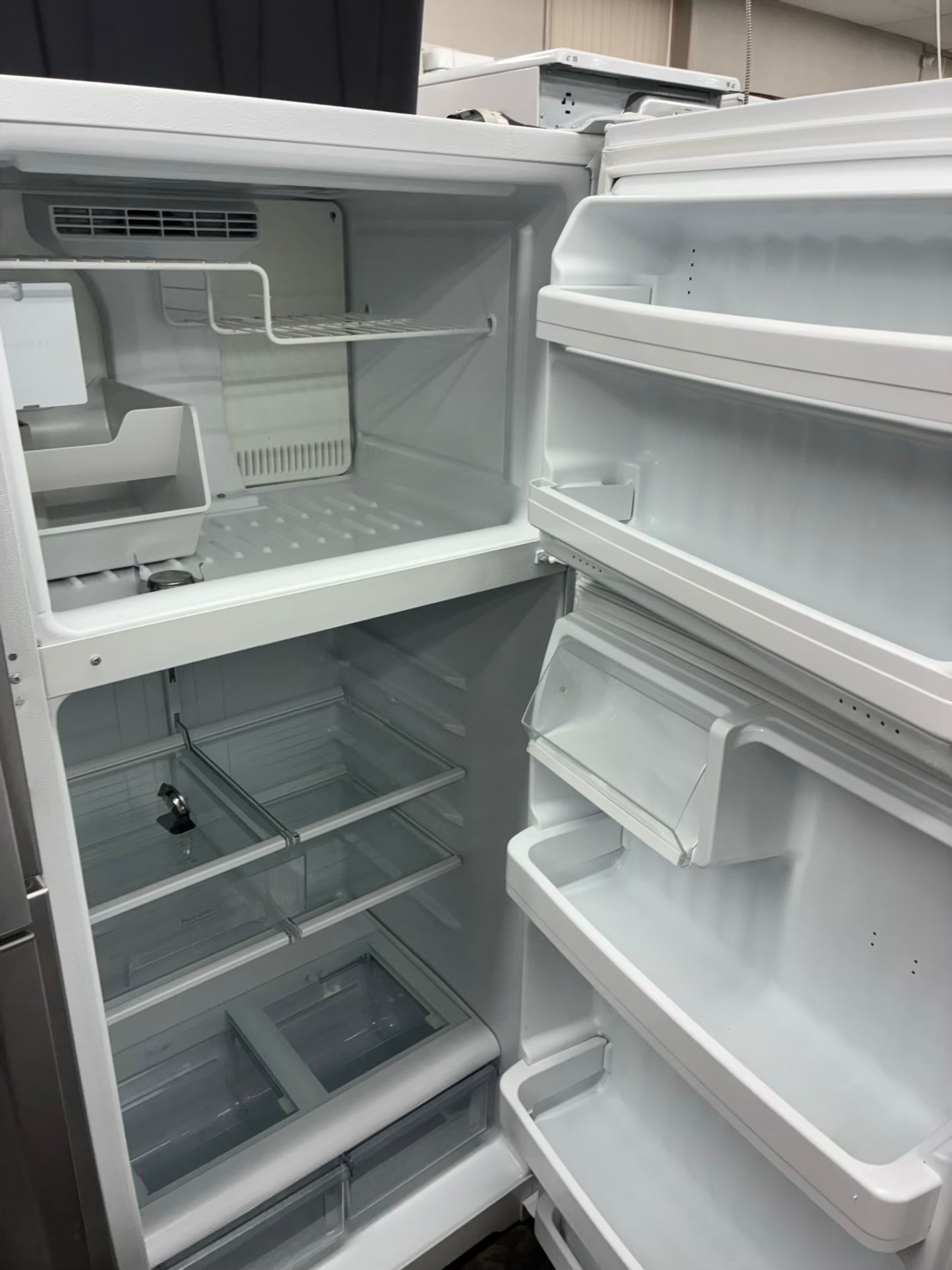 GE top freezer refrigerator white 28”