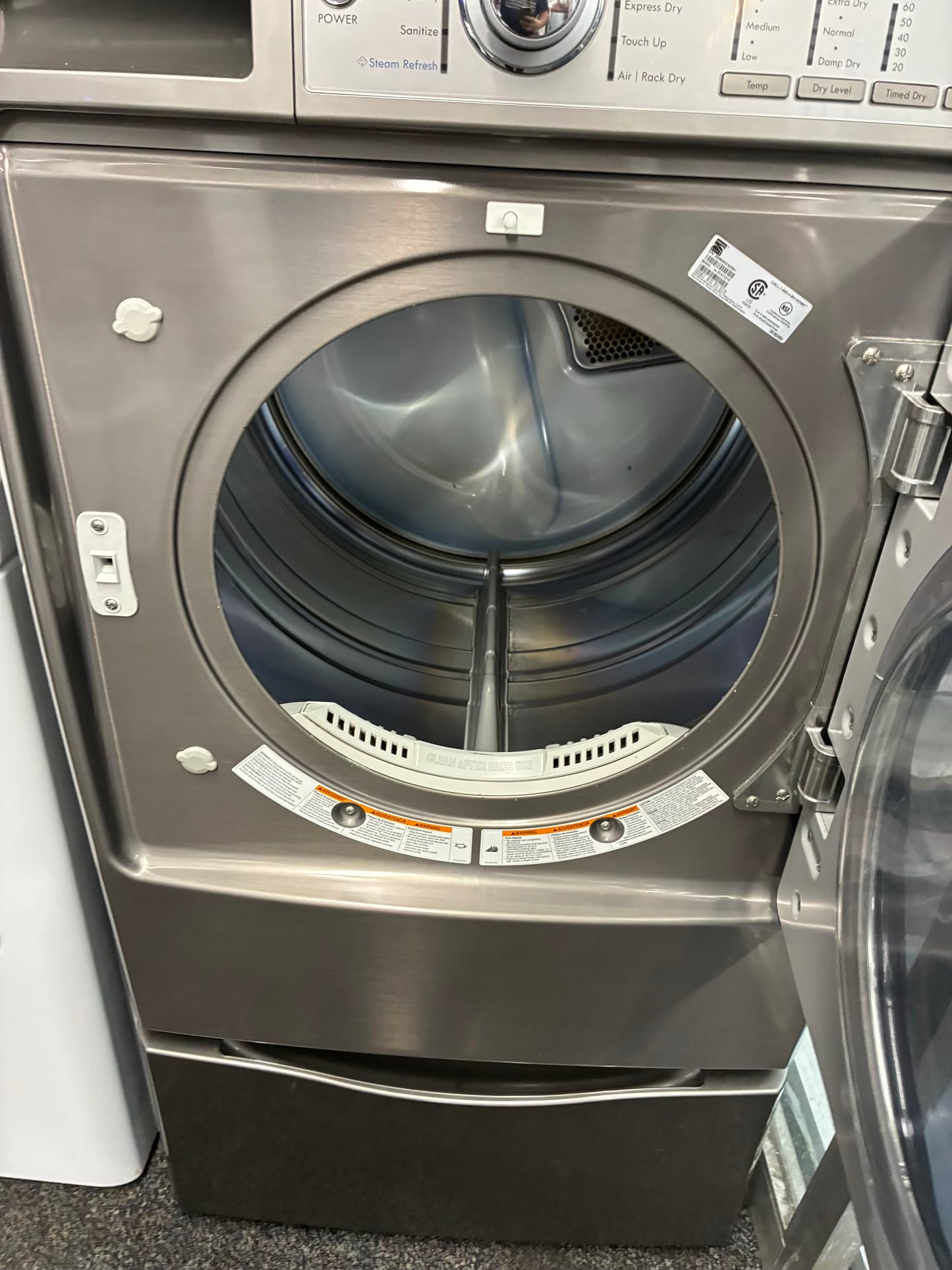 Kenmore  Electric Dryer 27”  white front load with pedestal