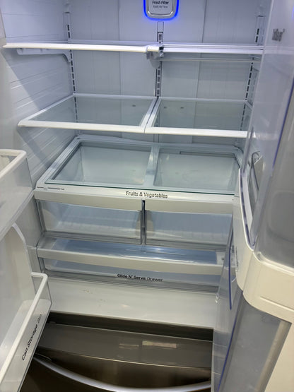 LG French door refrigerator stainless steel 33” ice maker water dispenser show case