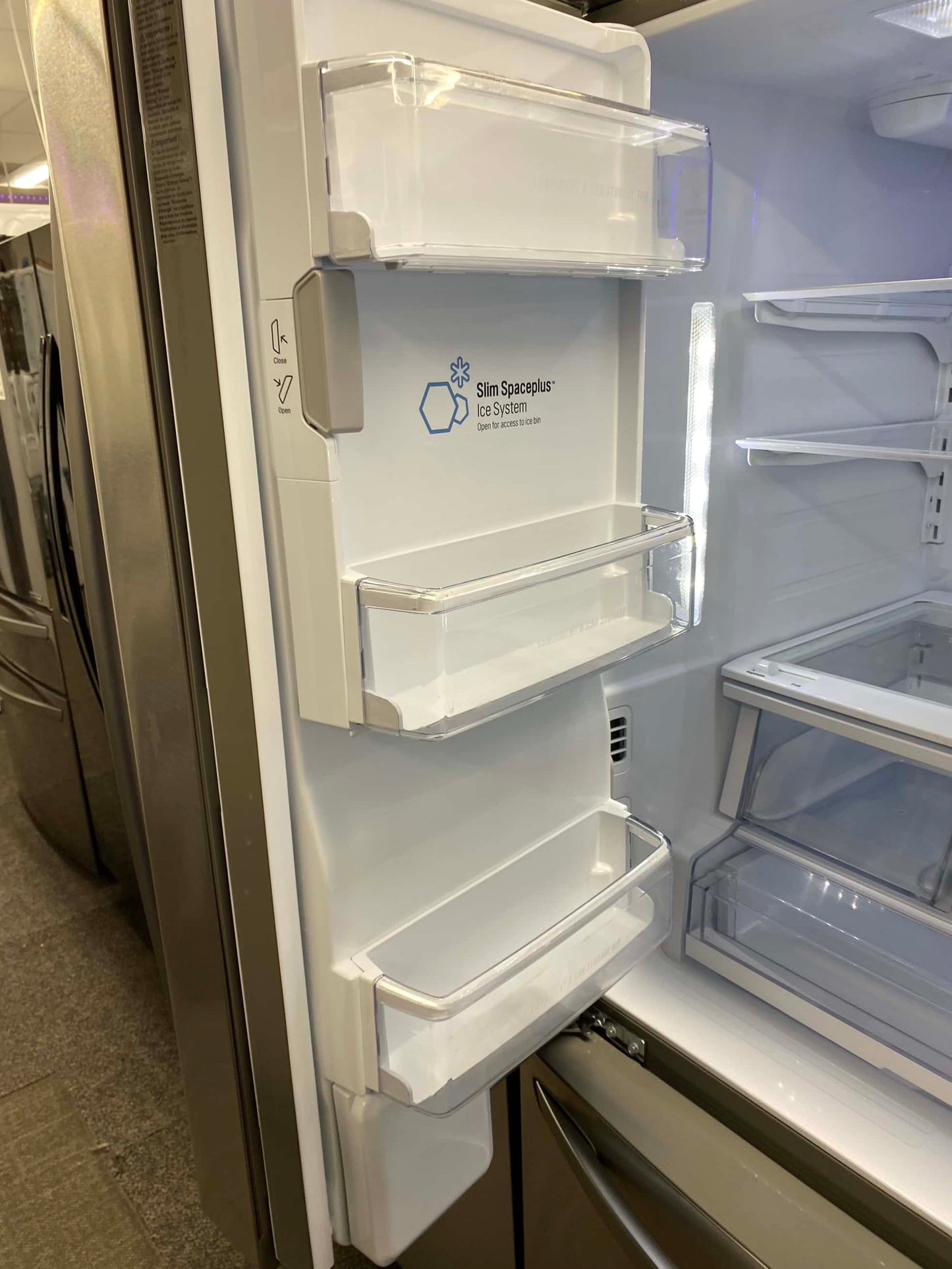 Item: #RF64G LG French door refrigerator stainless steel w/water ice dispenser 36 in.
