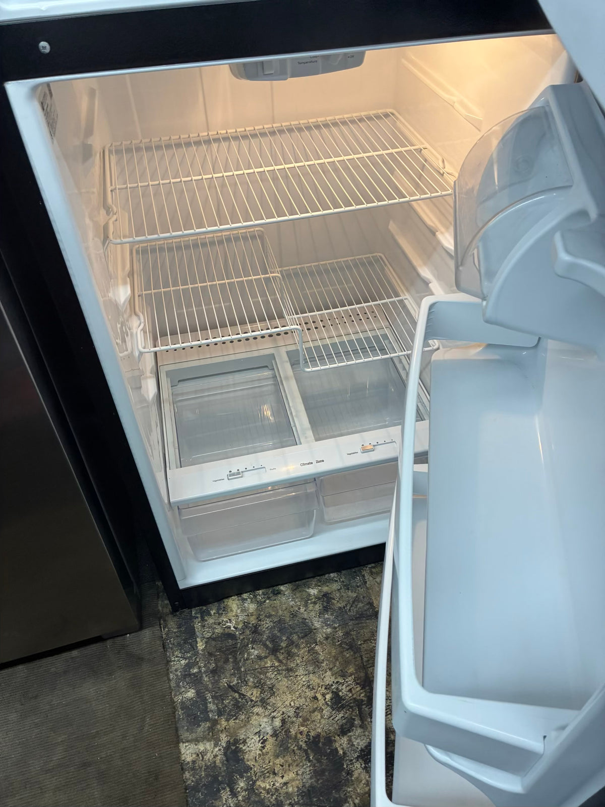 GE top freezer refrigerator  30” black