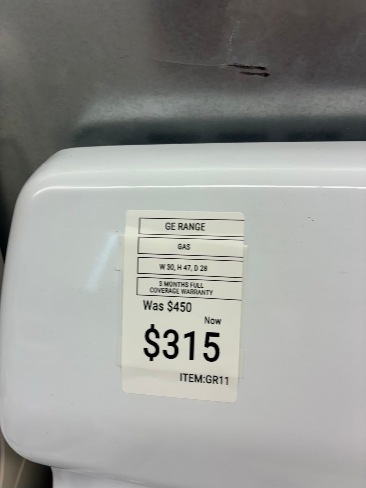 GE gas range , 4 burner white color 30”