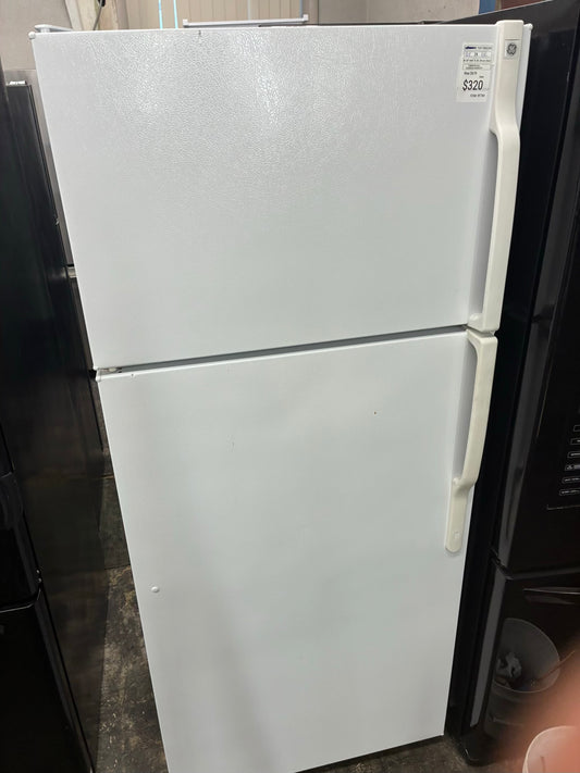 GE top freezer refrigerator  28”