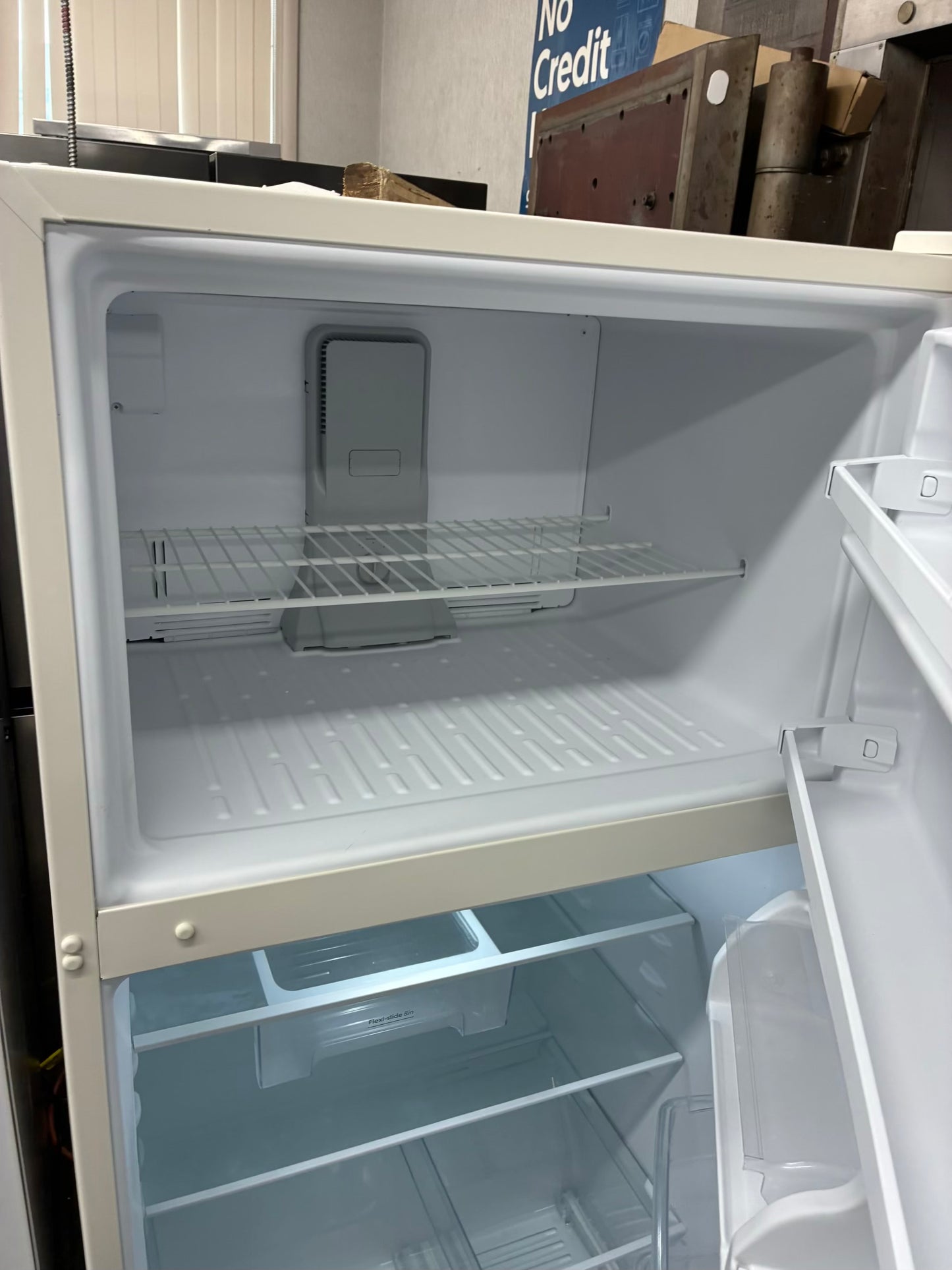 Whirlpool top freezer refrigerator beige 33”