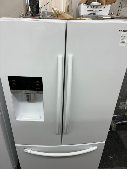 Samsung French door refrigerator white.  w/ ice and water dispenser inside 36” in