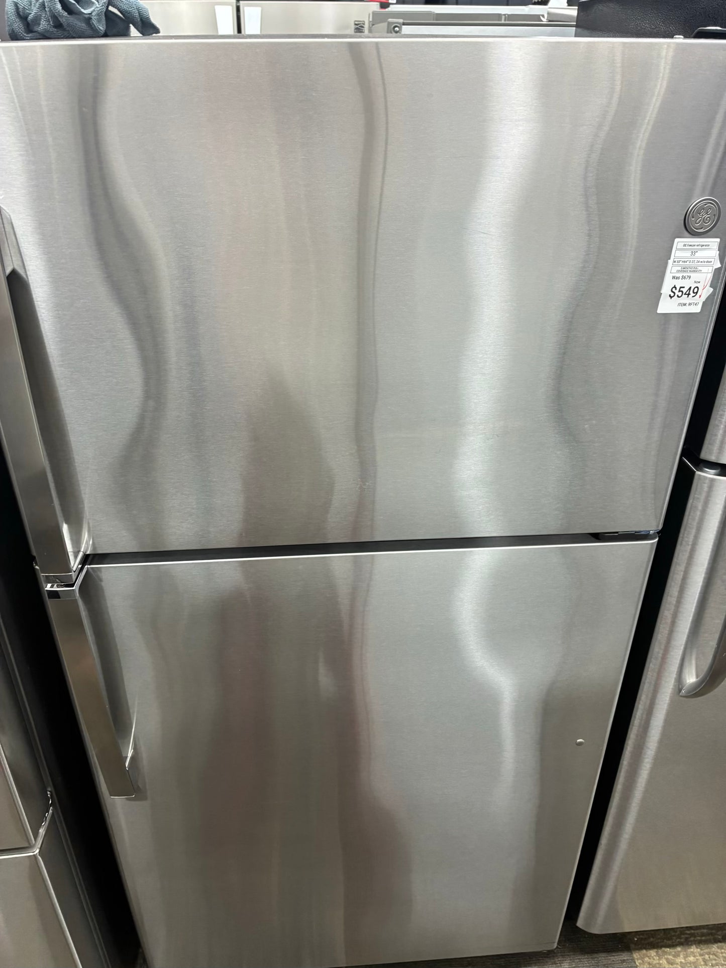 GE top freezer refrigerator stainless steel 33”