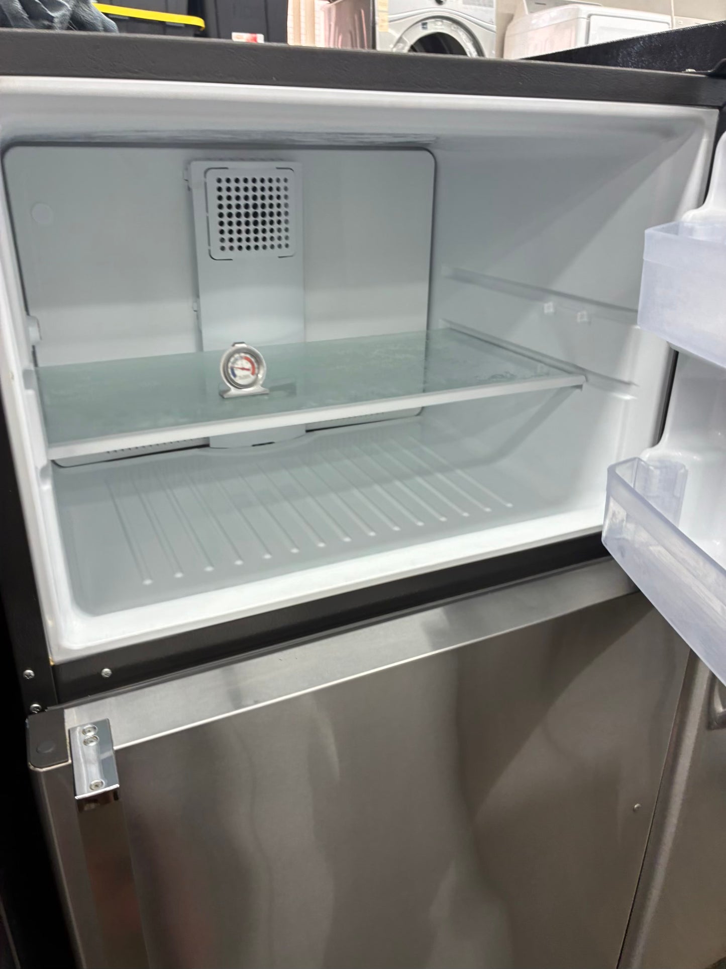 GE top freezer refrigerator stainless steel 33”