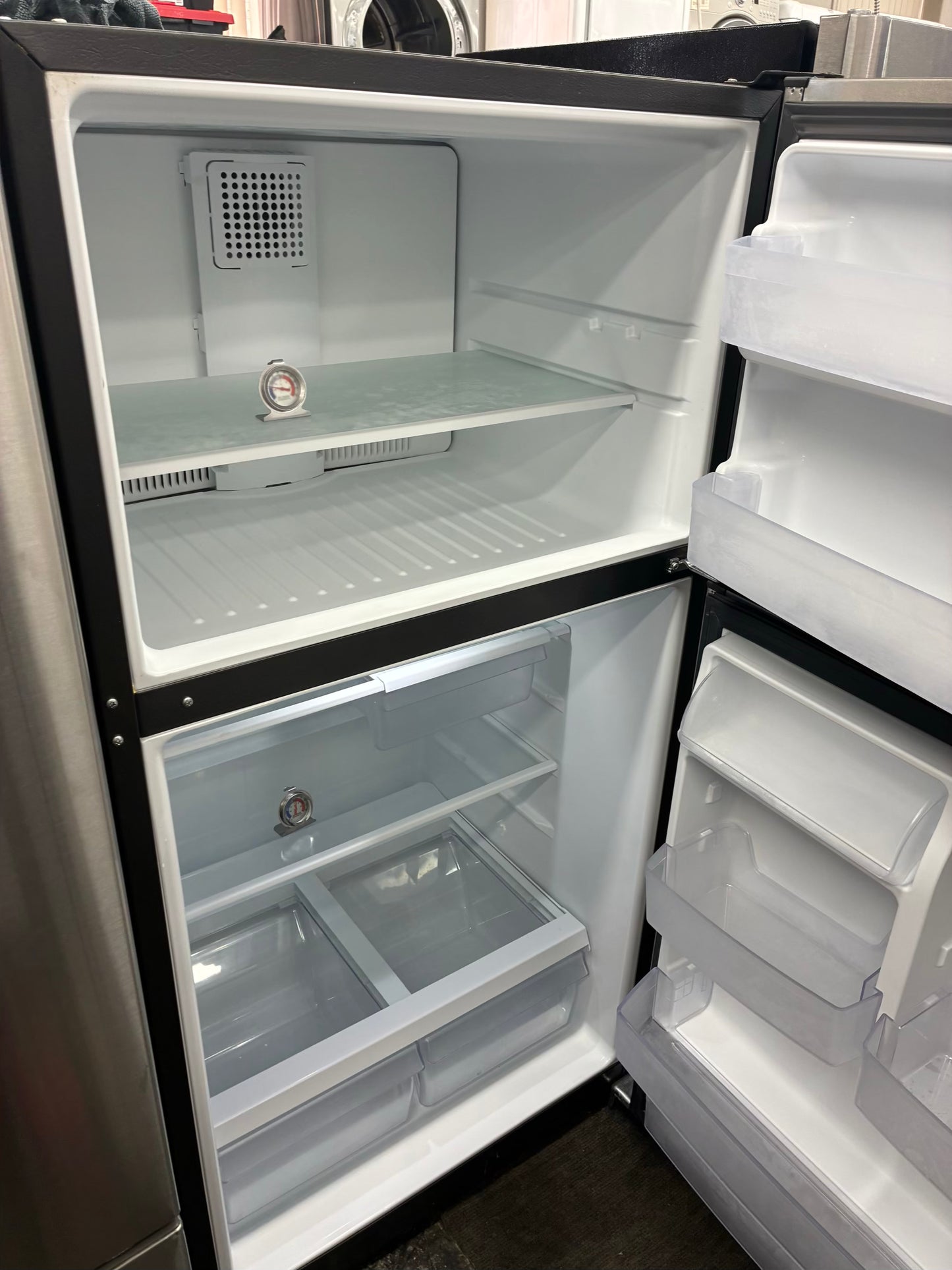 GE top freezer refrigerator stainless steel 33”