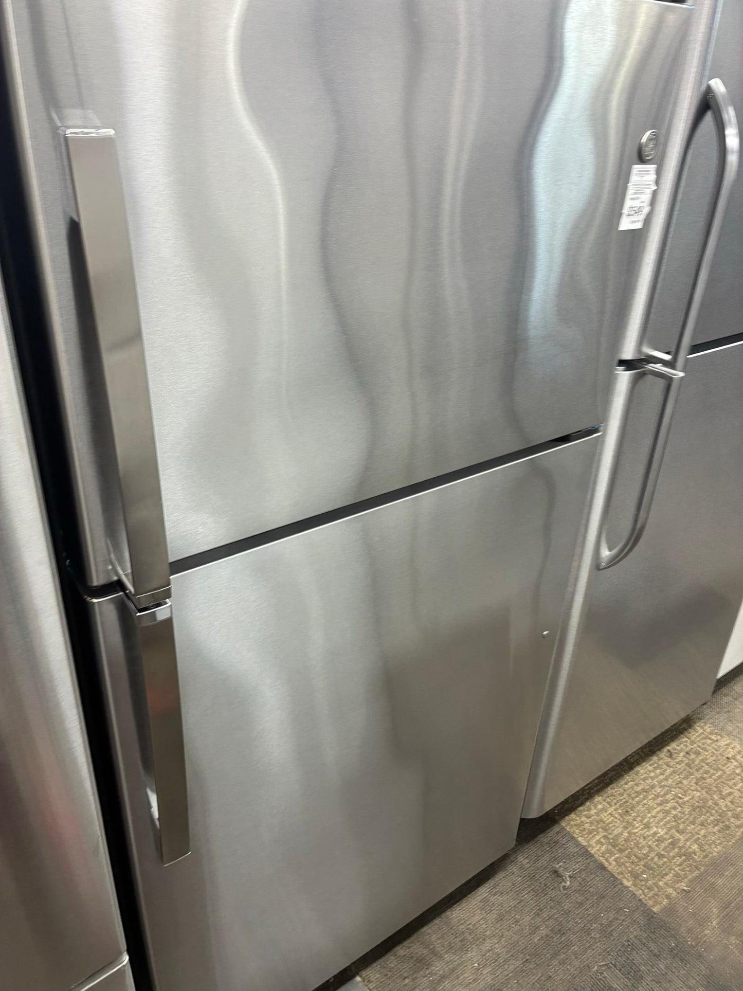 GE top freezer refrigerator stainless steel 33”